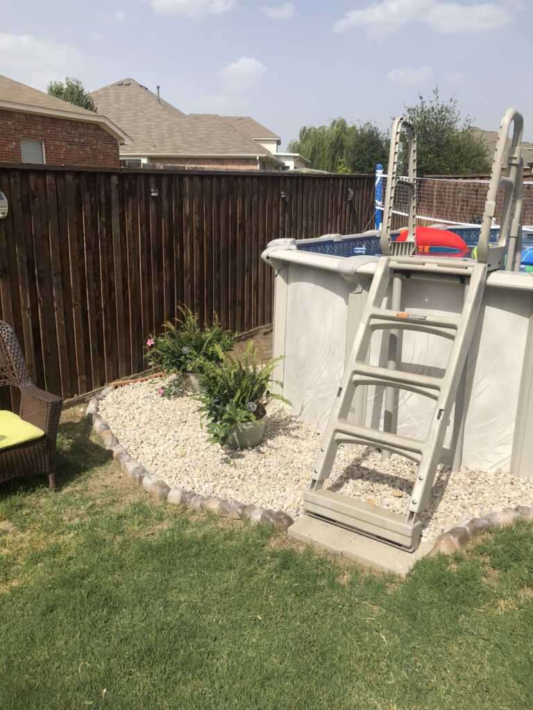 5 of the Best Accessories for an Above-Ground Pool 4 An above-ground pool featuring a safety ladder.