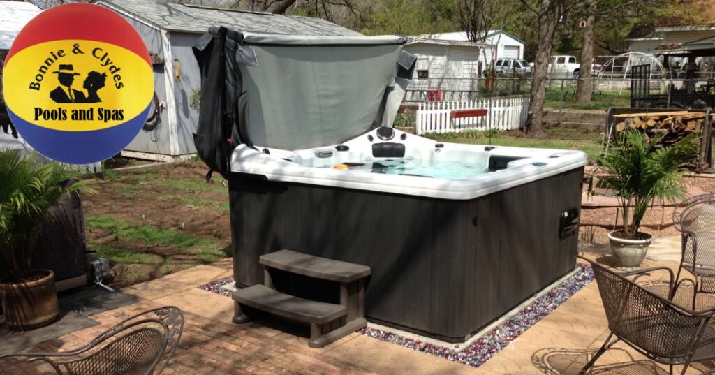 7 Important Summer Hot Tub Tips 4 A hot tub in a backyard setting